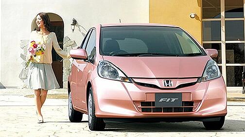 Woman and Honda Fit She's